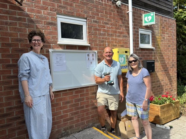 Noticeboard and postbox with councillors and clerk